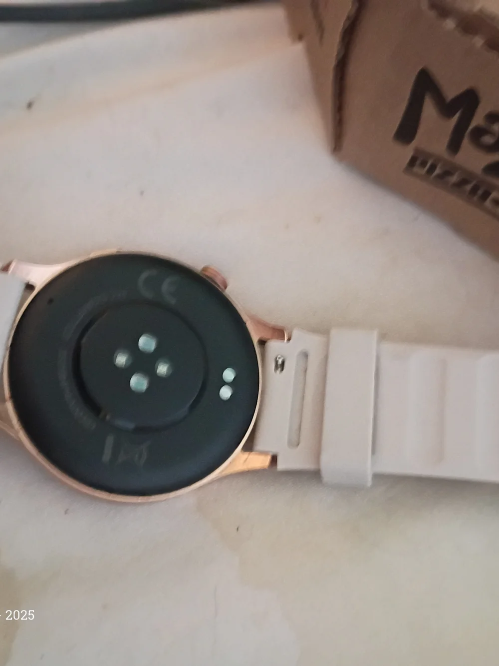 Smartwatch with White Silicone Band and Rose Gold Case